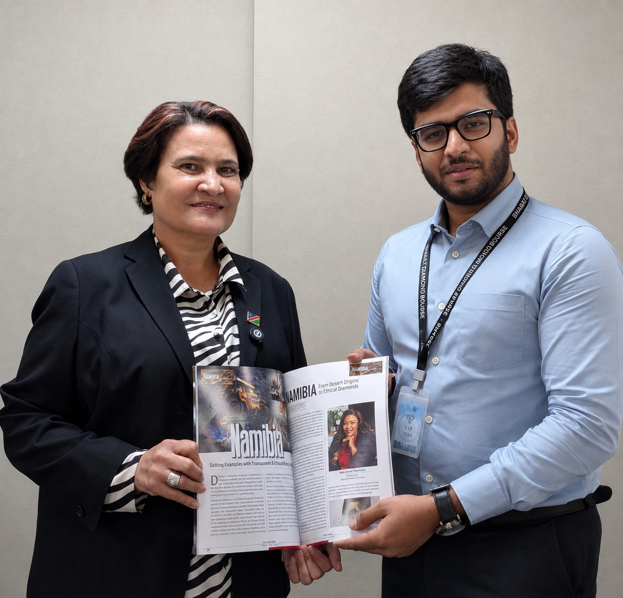 Ms. Gaudentia Kröhne receiving a copy of the international magazine